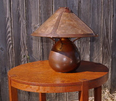 For scale, shown with large four light socket Dirk Van Erp lamp with vented cap.
Lamp measures over 19" wide.